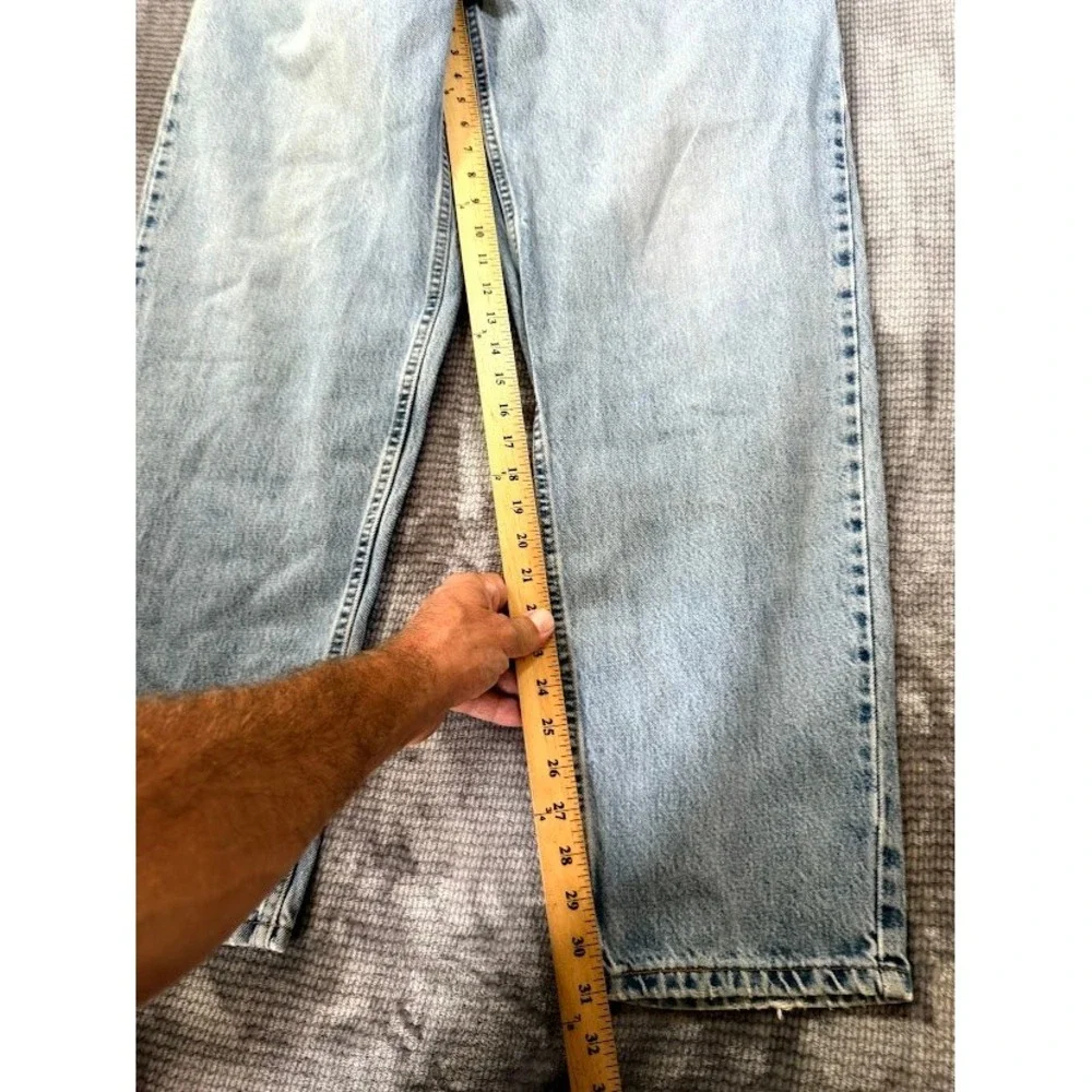 Vintage Levis 560 Loose Fit Tapered Leg Jeans Light Wash Denim USA Made 34x31
